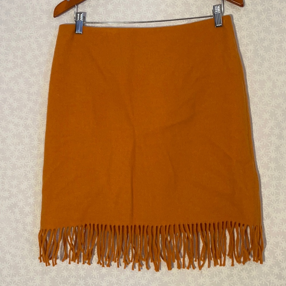 Warm orange Jones New York pencil skirt with tinsels on the bottom